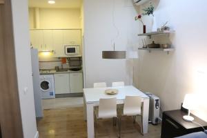 Kuchyň nebo kuchyňský kout v ubytování Apartamento Centro Histórico Sevilla