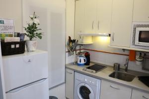 Kuchyň nebo kuchyňský kout v ubytování Apartamento Centro Histórico Sevilla