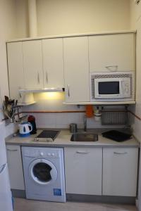 Kuchyň nebo kuchyňský kout v ubytování Apartamento Centro Histórico Sevilla
