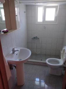 Koupelna v ubytování Kimi apartments