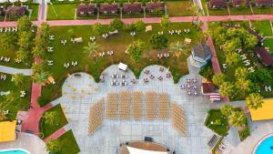 an aerial view of a resort with a pool at Pine Beach Belek in Belek