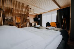 Posteľ alebo postele v izbe v ubytovaní Apartamenty Oliwia