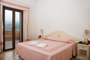Postel nebo postele na pokoji v ubytování Hotel Montiruju + 37 fotografií