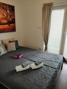 Postel nebo postele na pokoji v ubytování Apartmány U Stříbrných