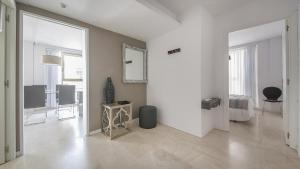 Televízia a/alebo spoločenská miestnosť v ubytovaní Apartment Unio, TarracoHomes