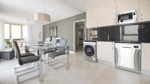 A kitchen or kitchenette at Apartment Unio, TarracoHomes