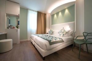 Postel nebo postele na pokoji v ubytování Ark Hotel