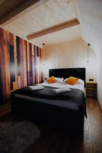 Posteľ alebo postele v izbe v ubytovaní Apartamenty Oliwia