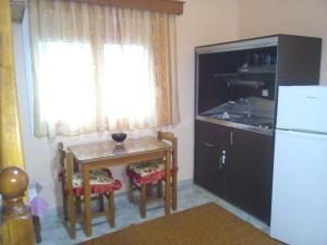Kuchyň nebo kuchyňský kout v ubytování Kimi apartments