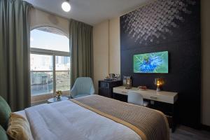 Cama ou camas em um quarto em TIME Express Hotel Al Khan