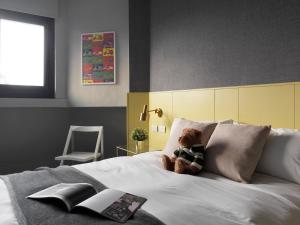 Letto o letti in una camera di Mr.Mantter