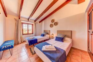 Posteľ alebo postele v izbe v ubytovaní Villa Font Xica Gran by Sealand Villas + 24 fotografií