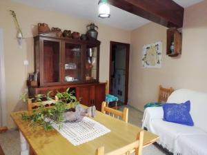 Łóżko lub łóżka w pokoju w obiekcie Casa Rural Abuela Maxi