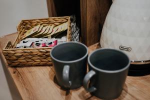 Príslušenstvo na prípravu kávy alebo čaju v ubytovaní Apartamenty Oliwia