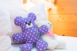 Łóżko lub łóżka w pokoju w obiekcie Reitanlage Dagnhof