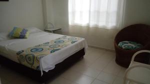 Postel nebo postele na pokoji v ubytování Condominio Girardot Resort