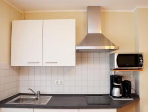 Kuchyň nebo kuchyňský kout v ubytování Gästehaus Guntersblum