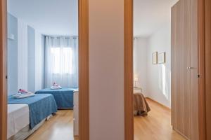 Posteľ alebo postele v izbe v ubytovaní Alcam Rubi