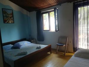 Posteľ alebo postele v izbe v ubytovaní Apartment Veroni