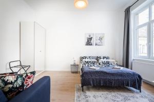 Posteľ alebo postele v izbe v ubytovaní BpR Blooming Design Home with A/C
