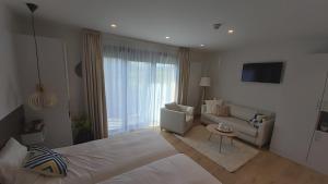 Katil atau katil-katil dalam bilik di Villa Thermae Santenay +55 gambar