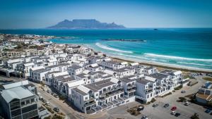 an aerial view of a beach with white buildings at Luxury Ocean View 2 Bed Apartment 259 Eden on the Bay, Blouberg, Cape Town in Big Bay