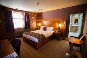 Krevet ili kreveti u jedinici u okviru objekta The Crown Hotel Bawtry-Doncaster
