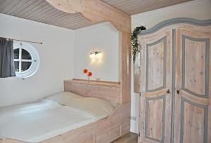 Ένα ή περισσότερα κρεβάτια σε δωμάτιο στο PW Luett Drosselhoern 1