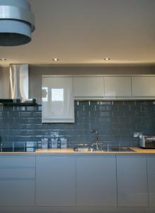 O bucătărie sau chicinetă la Alpha Spa classic 1 bedroom apartment