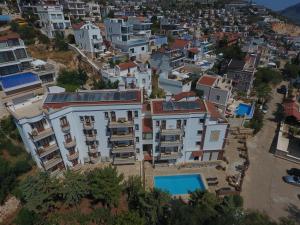 an aerial view of a city with houses at Kulube Hotel in Kalkan