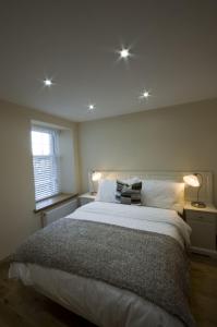 Katil atau katil-katil dalam bilik di Harviestoun House