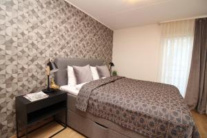 Postel nebo postele na pokoji v ubytování Tallinn City Apartments Roosikrantsi