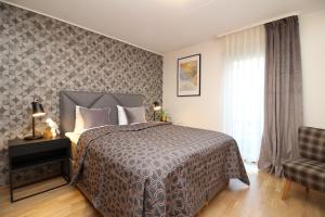 Postel nebo postele na pokoji v ubytování Tallinn City Apartments Roosikrantsi