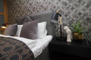 Postel nebo postele na pokoji v ubytování Tallinn City Apartments Roosikrantsi