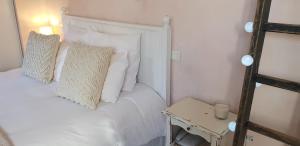 Postel nebo postele na pokoji v ubytování Hôtel Terminus