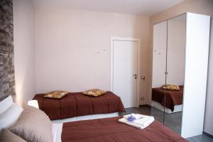 Posteľ alebo postele v izbe v ubytovaní Brio Bed & Breakfast