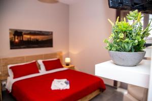 Posteľ alebo postele v izbe v ubytovaní Brio Bed & Breakfast