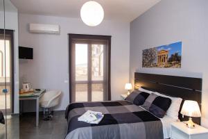 Posteľ alebo postele v izbe v ubytovaní Brio Bed & Breakfast