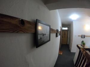 Telewizja i/lub zestaw kina domowego w obiekcie Penzion & Restaurant Pod Čerťákem