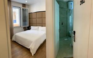 Voodi või voodid majutusasutuse Ramel Hotel toas