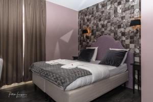 Ліжко або ліжка в номері Dock 29