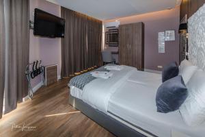 Ліжко або ліжка в номері Dock 29