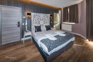 Ліжко або ліжка в номері Dock 29