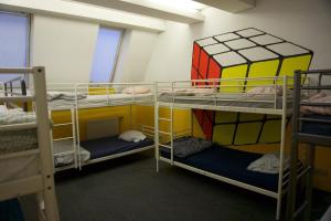 Voodi või voodid majutusasutuse Vitae Hostel toas