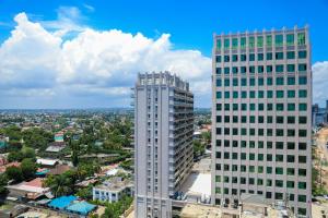 an overhead view of two tall buildings in a city at Lark Hotel in Dar es Salaam