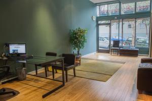 an office with a desk and chairs and a table at Casa Loma Hotel in San Francisco