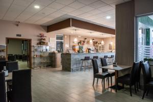 A restaurant or other place to eat at Hotel Ancora
