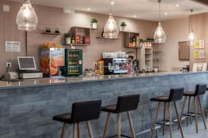 The lounge or bar area at Hotel Ancora