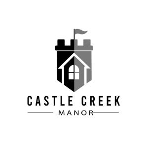 Et logo, certifikat, skilt eller en pris der bliver vist frem på Castle Creek Manor