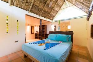 Ліжко або ліжка в номері Rio Hostel Buritaca